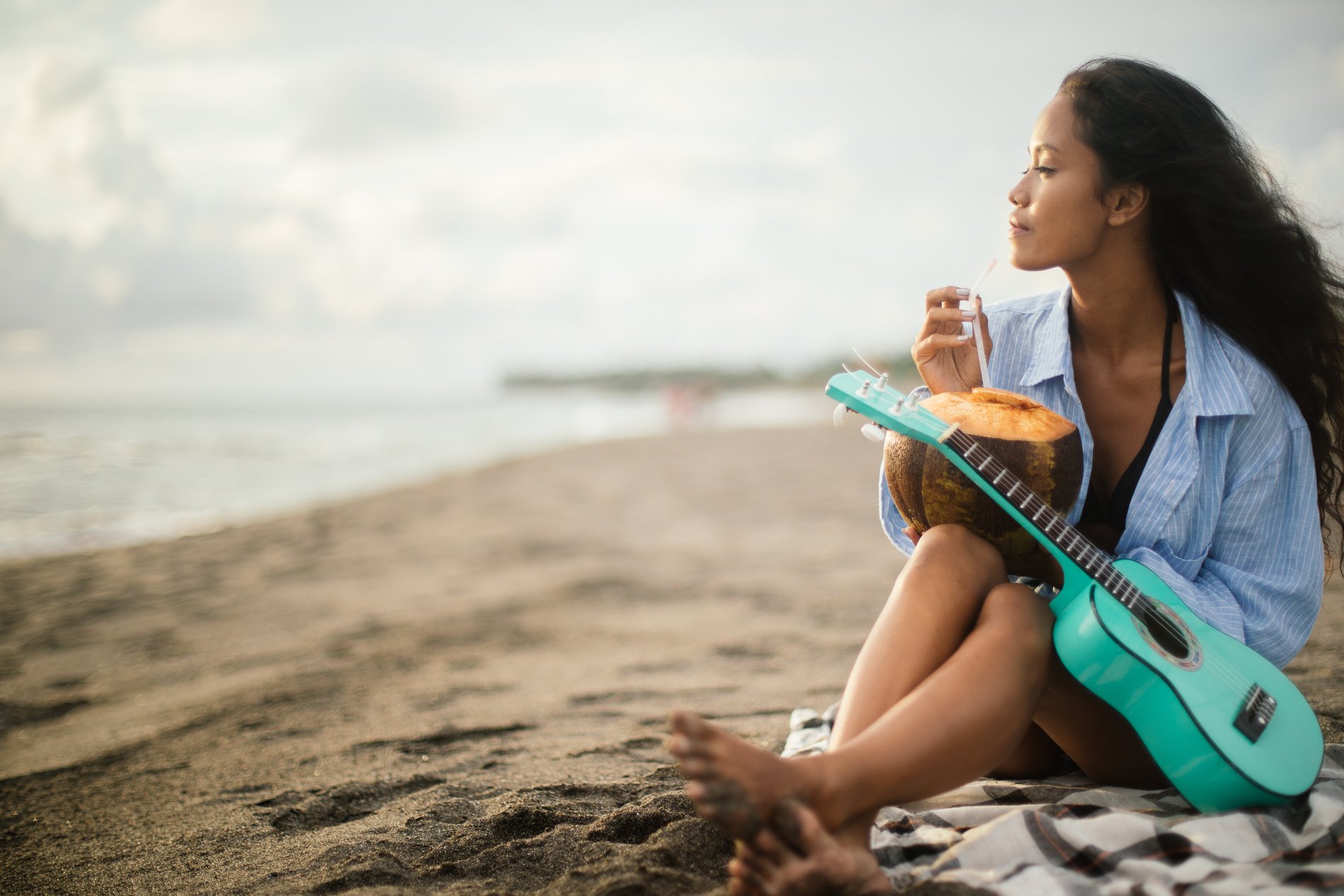 Lady relaxing on the beach